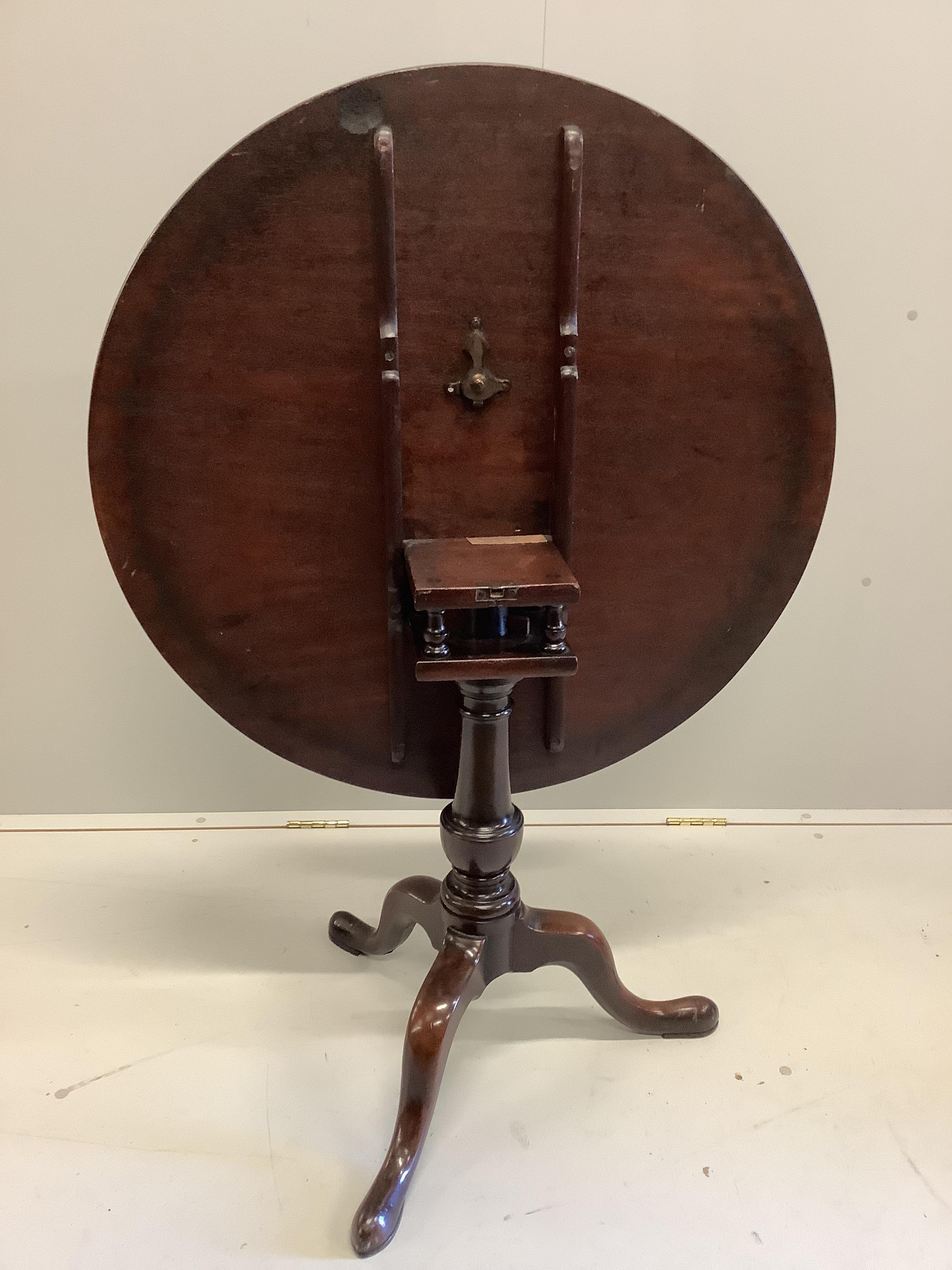A George III circular mahogany tilt top birdcage tea table, diameter 87cm, height 72cm